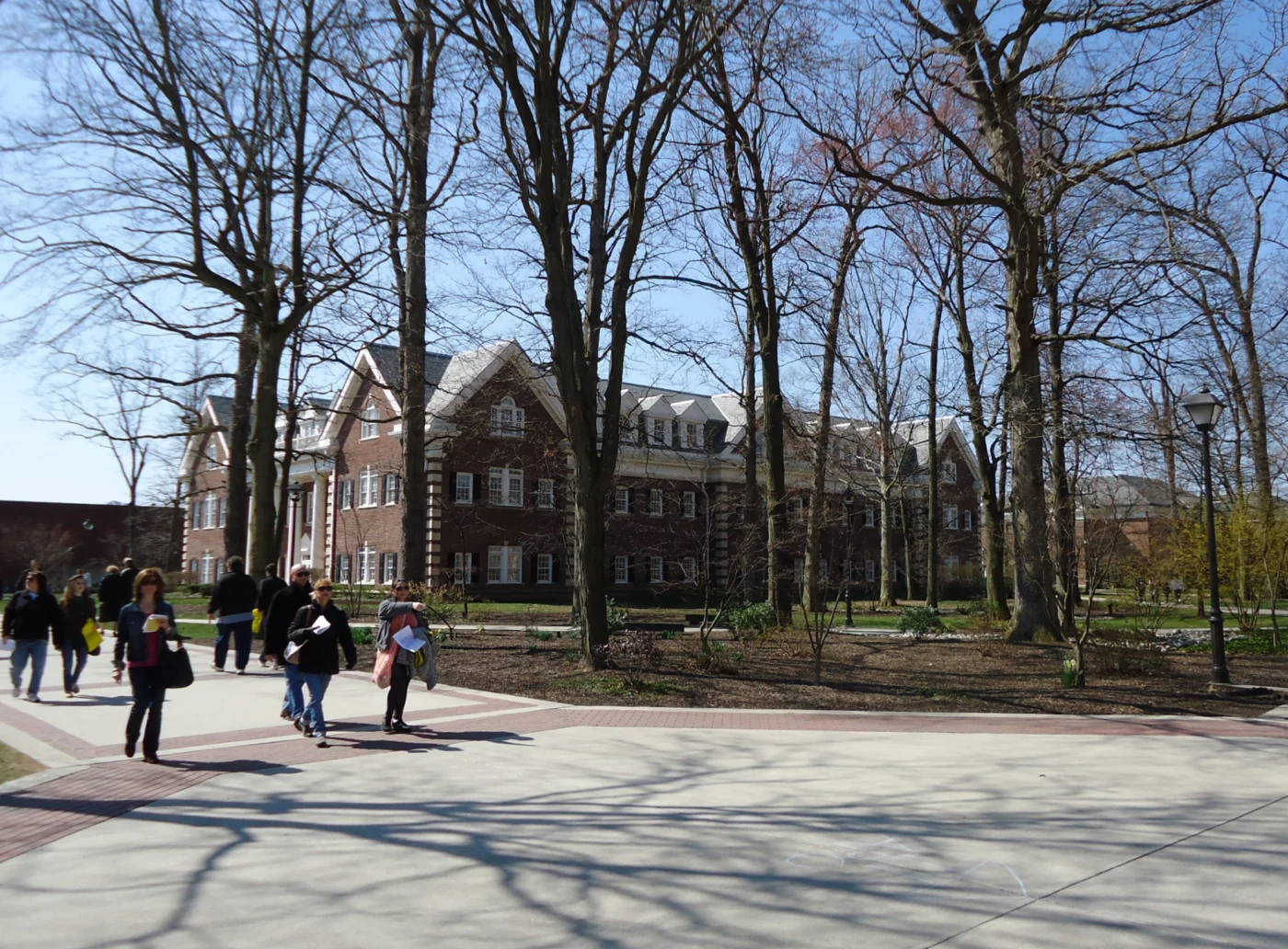 Students gathered outdoors at a campus event, the kind of turnout event promo is built for