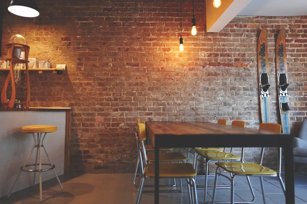 Customers sitting together in a small coffee shop